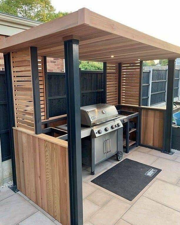 a covered backyard grilling area