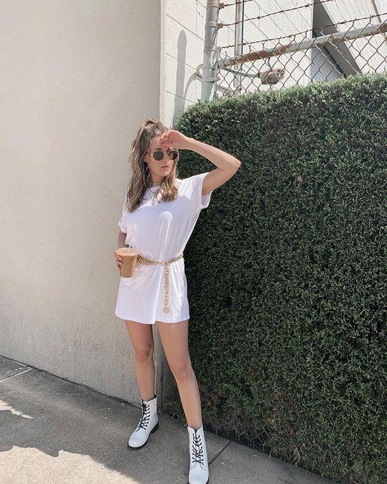Large white t-shirt and combat boots