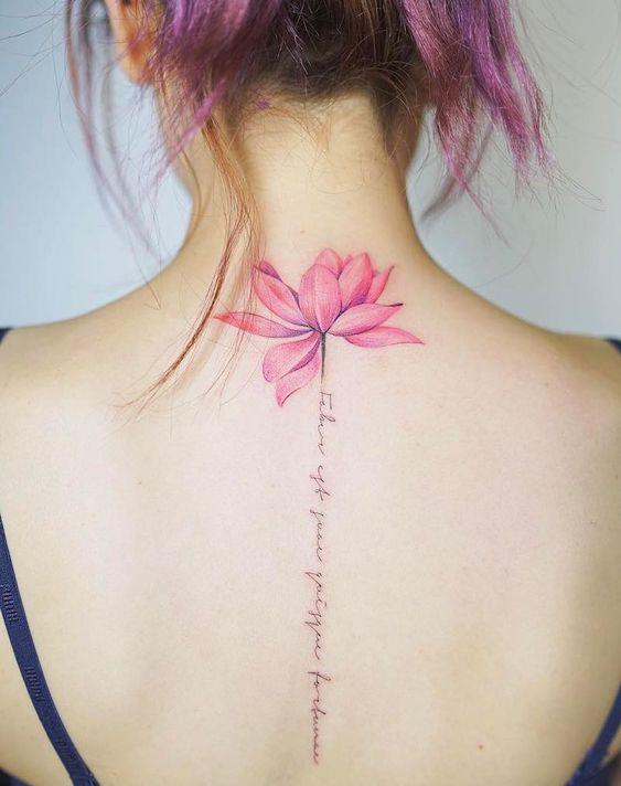 Lotus Flower Spine Tattoo_one of Baddie Women's Feminine Spine Tattoos