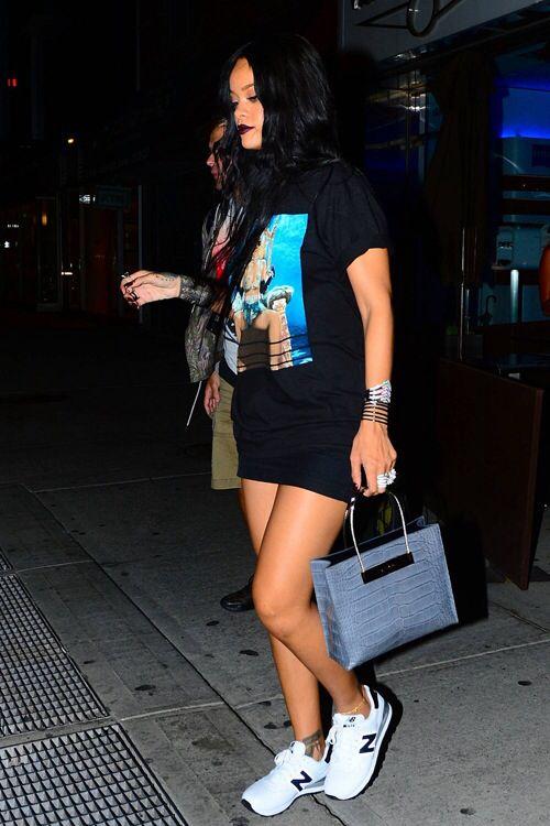 Rihanna in 90s oversized t-shirt and sneakers