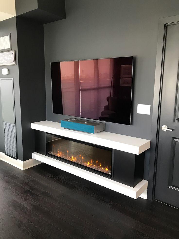 Floor-To-Ceiling Gray Wall TV And Fireplace Wall