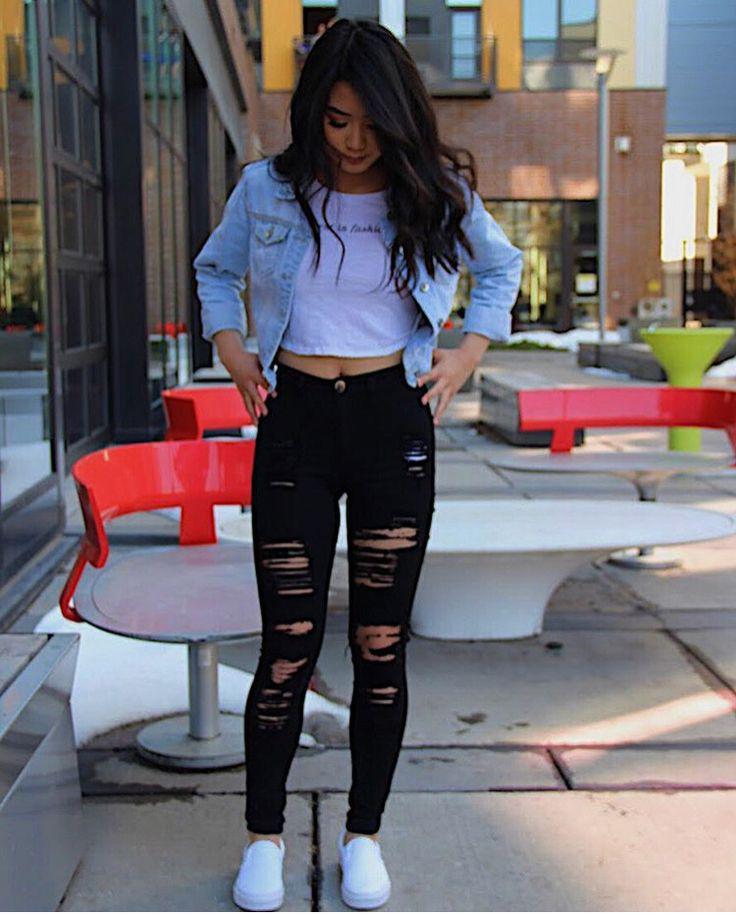 Girl in Jean jacket, white tank, and ripped black jeans –Urban Birthday Outfit